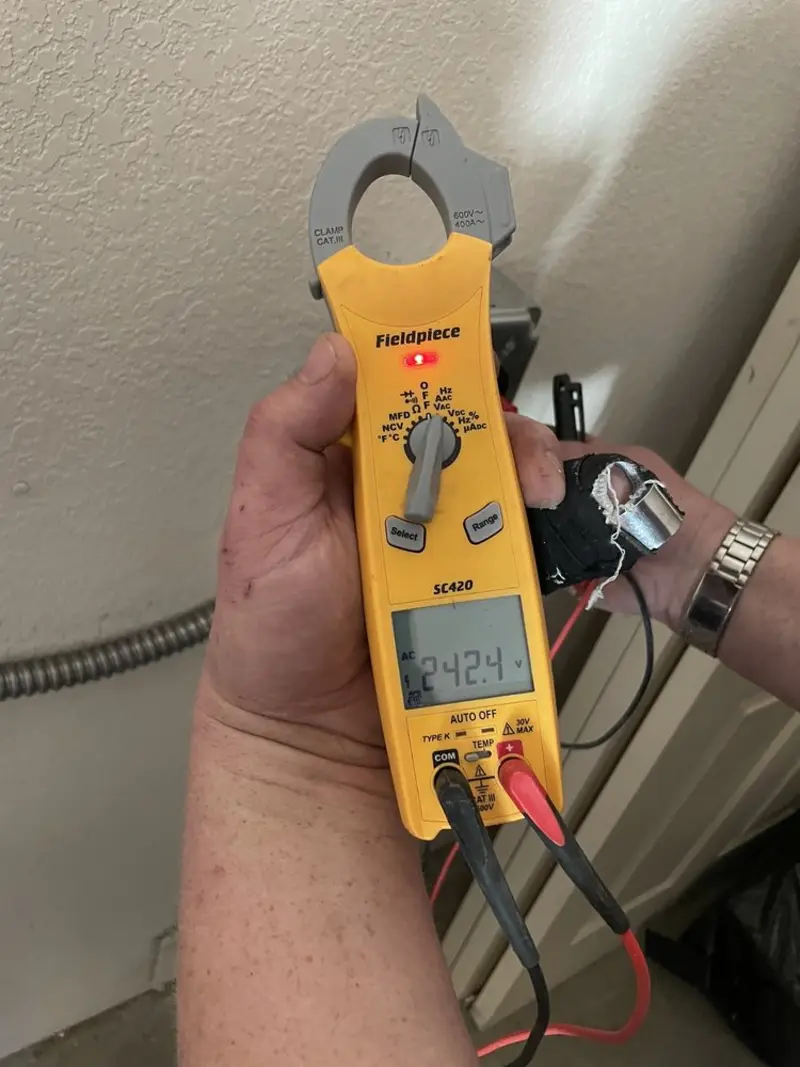 Voltage testing with clamp meter during Aluminum Wiring Replacement in Pace